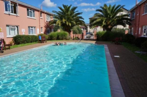 New Esplanade Court Beachfront One bedroom Apartment with Seasonal Swimming pool